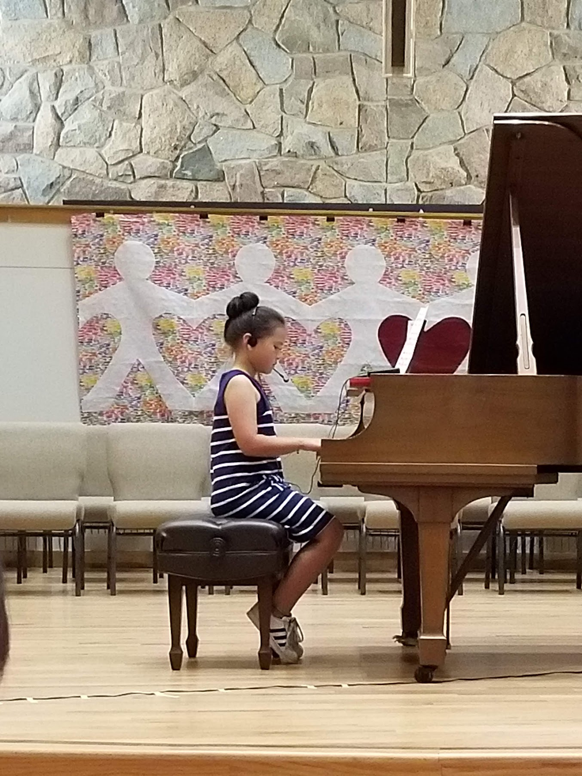 Kaylee playing piano photo